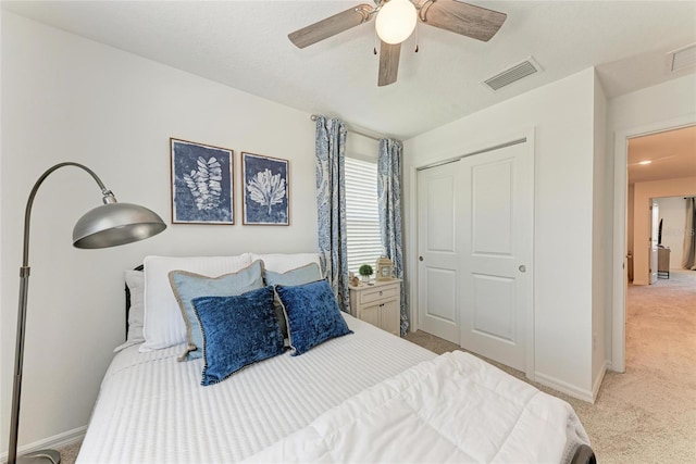 5711 Archipelago St, Nokomis, FL 34275 - bedroom featuring light colored carpet, a closet, and a ceiling fan
