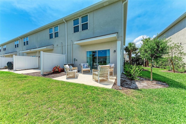 5711 Archipelago St, Nokomis, FL 34275 - rear view of property featuring a patio and stucco siding