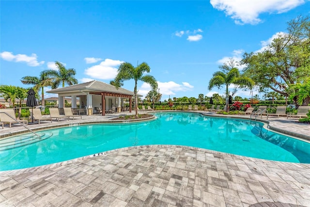 5711 Archipelago St, Nokomis, FL 34275 - community pool featuring a patio