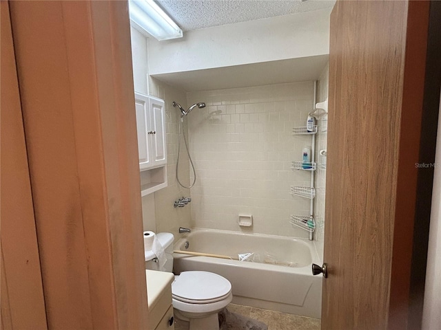 4199 66th Street Cir W Unit 4199, Bradenton, FL 34209 - full bath with shower / washtub combination, a textured ceiling, vanity, and tile patterned floors