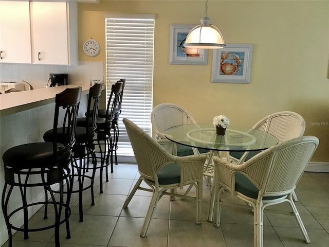 5310 Gulf Of Mexico Dr Unit 18, Longboat Key, FL 34228 - dining space featuring light tile patterned flooring