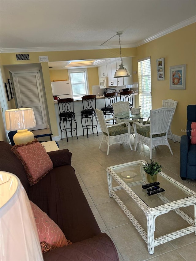 5310 Gulf Of Mexico Dr Unit 18, Longboat Key, FL 34228 - living area with ornamental molding and tile patterned floors