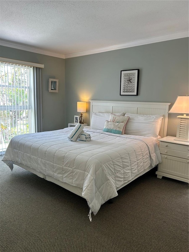 5310 Gulf Of Mexico Dr Unit 18, Longboat Key, FL 34228 - bedroom with crown molding, dark carpet, access to exterior, and a textured ceiling