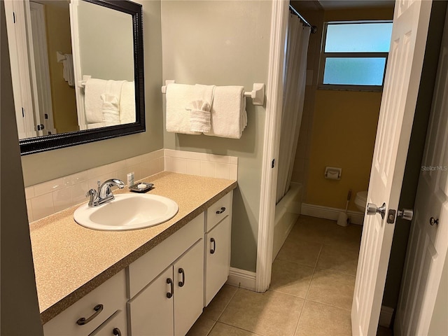 5310 Gulf Of Mexico Dr Unit 18, Longboat Key, FL 34228 - bathroom with vanity, tile patterned flooring, and shower / bath combination with curtain
