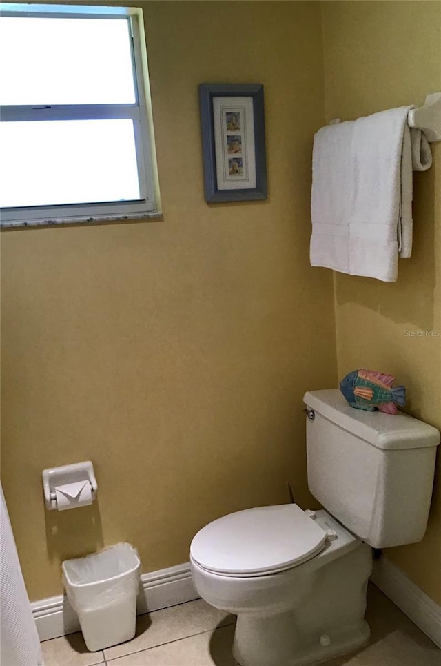 5310 Gulf Of Mexico Dr Unit 18, Longboat Key, FL 34228 - bathroom with tile patterned floors and baseboard heating