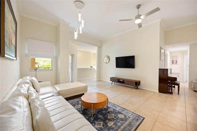 1064 N Tamiami Trl Unit 1125, Sarasota, FL 34236 - living area featuring crown molding, light tile patterned floors, and a ceiling fan