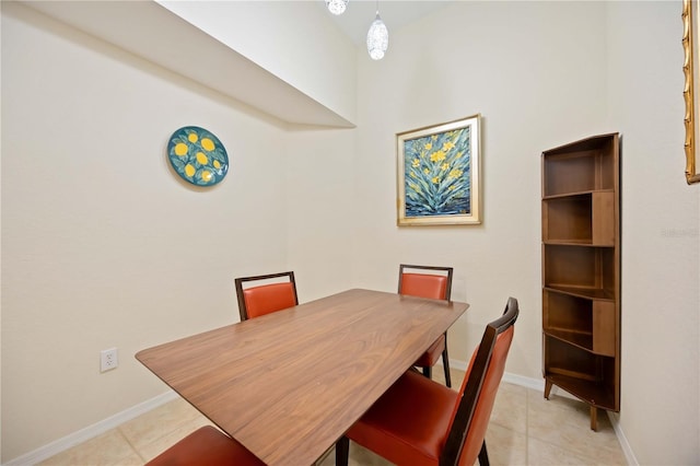1064 N Tamiami Trl Unit 1125, Sarasota, FL 34236 - dining room featuring light tile patterned floors