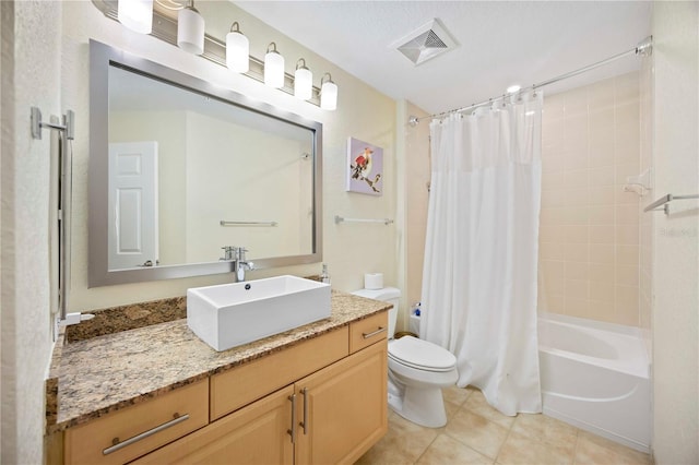 1064 N Tamiami Trl Unit 1125, Sarasota, FL 34236 - bathroom with vanity, tile patterned flooring, and shower / tub combo