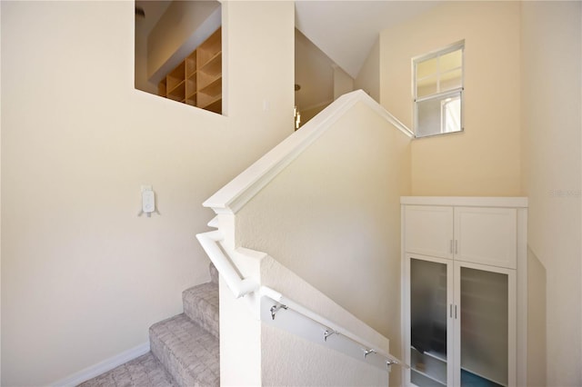 1064 N Tamiami Trl Unit 1125, Sarasota, FL 34236 - stairs featuring baseboards