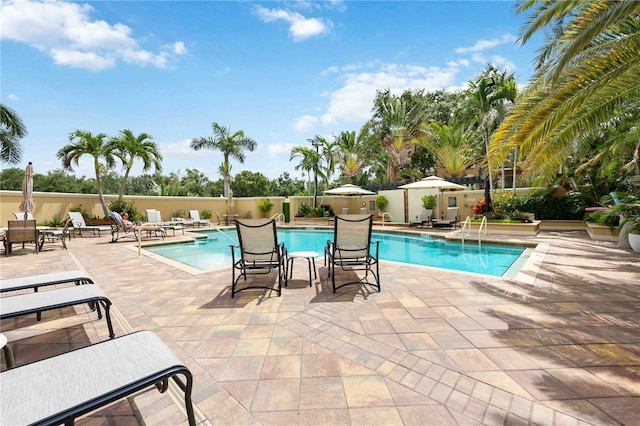 1064 N Tamiami Trl Unit 1125, Sarasota, FL 34236 - community pool featuring a patio