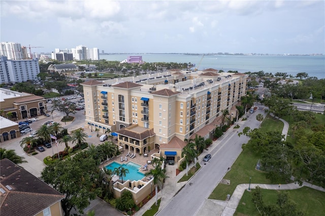 1064 N Tamiami Trl Unit 1125, Sarasota, FL 34236 - drone / aerial view of a pool and a nearby body of water