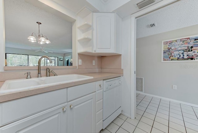 7110 Fairway Bend Ln Unit 181, Sarasota, FL 34243 - kitchen featuring dishwasher, a chandelier, white cabinets, light tile patterned floors, and light countertops