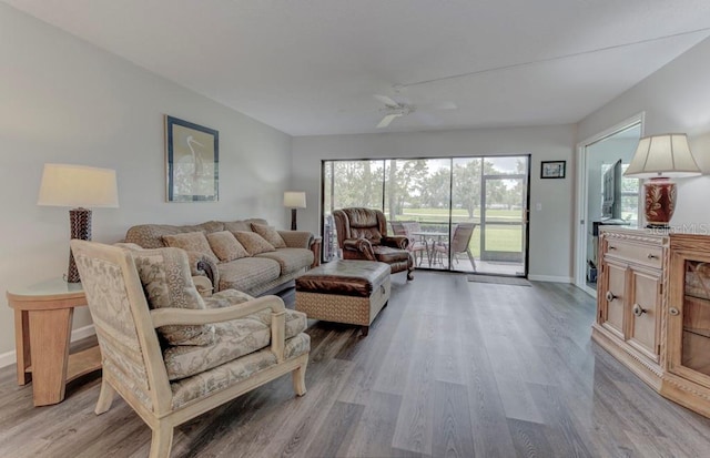 7110 Fairway Bend Ln Unit 181, Sarasota, FL 34243 - living area featuring light wood-style flooring and ceiling fan