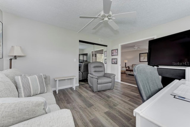 7110 Fairway Bend Ln Unit 181, Sarasota, FL 34243 - office space featuring ceiling fan, a textured ceiling, and wood finished floors