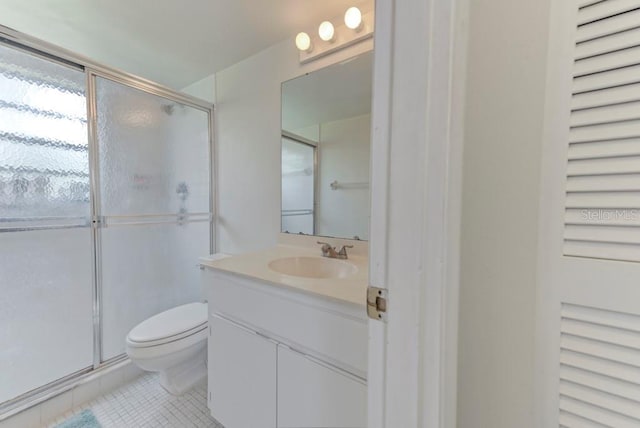 7110 Fairway Bend Ln Unit 181, Sarasota, FL 34243 - bathroom featuring tile patterned flooring, vanity, and a shower stall