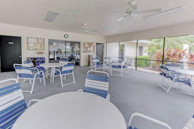 7110 Fairway Bend Ln Unit 181, Sarasota, FL 34243 - sunroom / solarium featuring outdoor dining area and a ceiling fan