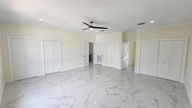 1240 Solitude Ln, Sarasota, FL 34242 - unfurnished bedroom with multiple closets, recessed lighting, marble finish floors, ceiling fan, and ornamental molding