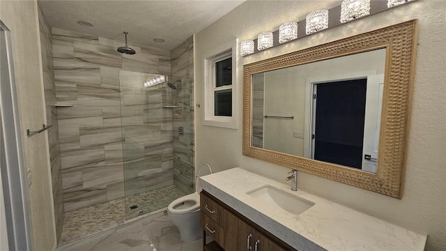1240 Solitude Ln, Sarasota, FL 34242 - bathroom featuring marble look tile flooring, vanity, a stall shower, a textured ceiling, and a textured wall