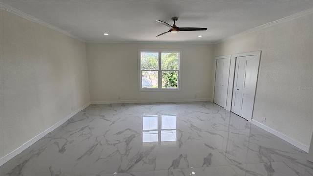 1240 Solitude Ln, Sarasota, FL 34242 - unfurnished bedroom featuring two closets, marble finish floors, crown molding, a ceiling fan, and recessed lighting
