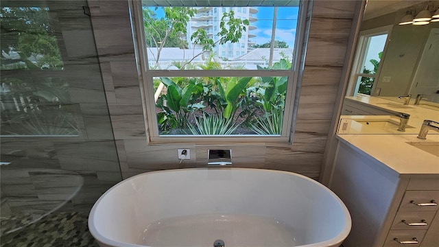 1240 Solitude Ln, Sarasota, FL 34242 - bathroom with vanity and a soaking tub
