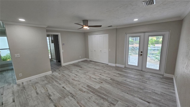 1240 Solitude Ln, Sarasota, FL 34242 - unfurnished room with french doors, a ceiling fan, wood finished floors, crown molding, and recessed lighting