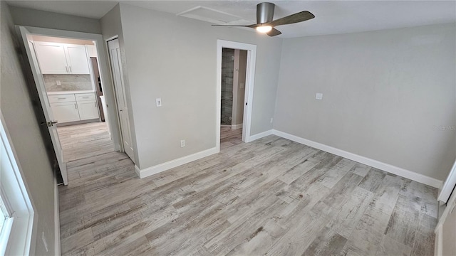1240 Solitude Ln, Sarasota, FL 34242 - empty room featuring light wood-style flooring and a ceiling fan
