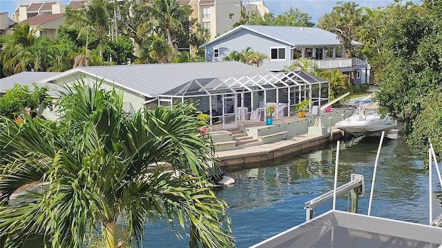 1240 Solitude Ln, Sarasota, FL 34242 - dock area featuring a water view, a lanai, and boat lift