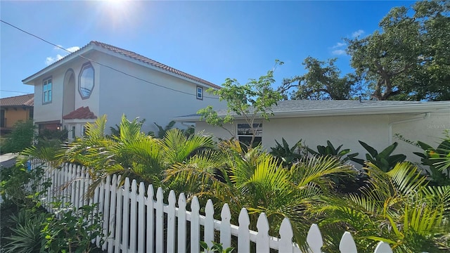 1240 Solitude Ln, Sarasota, FL 34242 - view of side of property featuring stucco siding