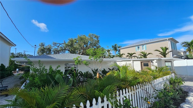 1240 Solitude Ln, Sarasota, FL 34242 - view of side of property featuring stucco siding