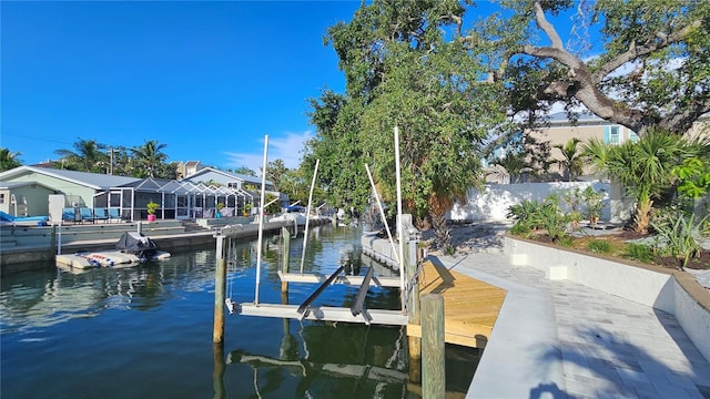 1240 Solitude Ln, Sarasota, FL 34242 - dock with boat lift and a water view