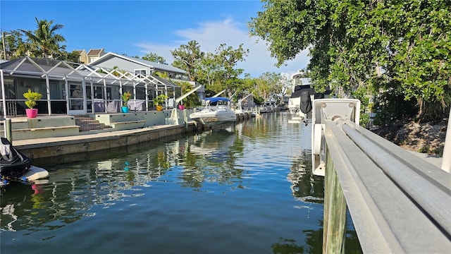 1240 Solitude Ln, Sarasota, FL 34242 - dock with a water view and glass enclosure