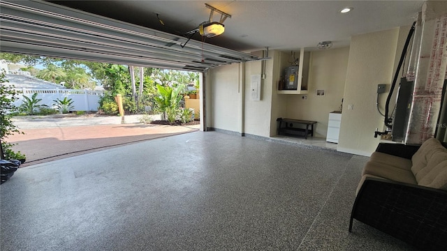 1240 Solitude Ln, Sarasota, FL 34242 - garage with water heater and recessed lighting