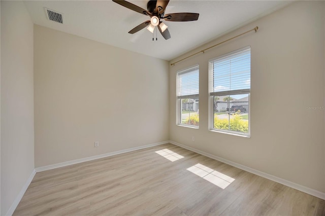 918 Fernleaf Run, Bradenton, FL 34212 - unfurnished room featuring light wood-style flooring and ceiling fan