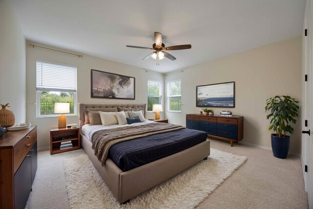 918 Fernleaf Run, Bradenton, FL 34212 - bedroom featuring light colored carpet and ceiling fan