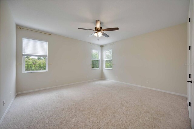 918 Fernleaf Run, Bradenton, FL 34212 - carpeted spare room featuring a ceiling fan and healthy amount of natural light