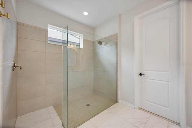 918 Fernleaf Run, Bradenton, FL 34212 - full bath with marble look tiles and a walk in shower