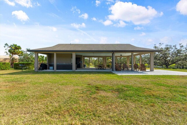 918 Fernleaf Run, Bradenton, FL 34212 - back of property featuring a lawn