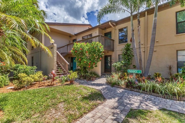 3810 75th St W Unit 128, Bradenton, FL 34209 - view of front facade with stairs and stucco siding