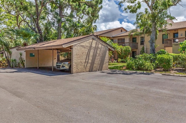3810 75th St W Unit 128, Bradenton, FL 34209 - view of covered parking lot