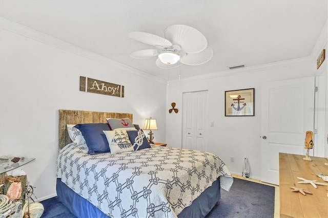 3810 75th St W Unit 128, Bradenton, FL 34209 - bedroom with ornamental molding, a closet, and ceiling fan