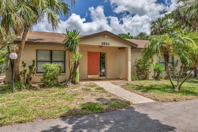 3810 75th St W Unit 128, Bradenton, FL 34209 - view of front of property featuring stucco siding