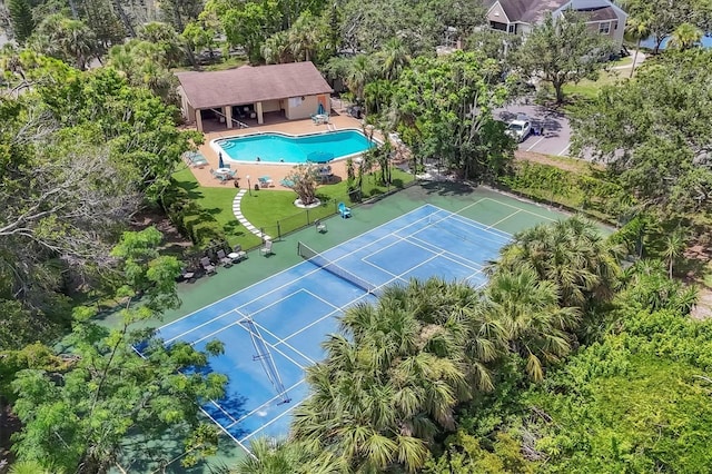 3810 75th St W Unit 128, Bradenton, FL 34209 - bird's eye view of a pool and a tree filled landscape