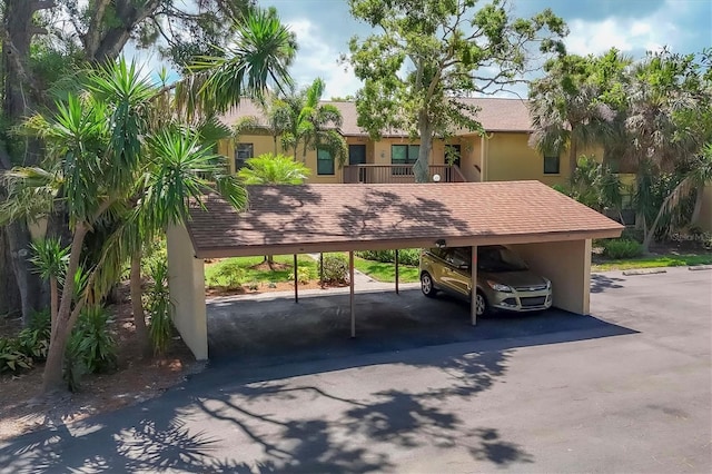 3810 75th St W Unit 128, Bradenton, FL 34209 - view of covered parking lot