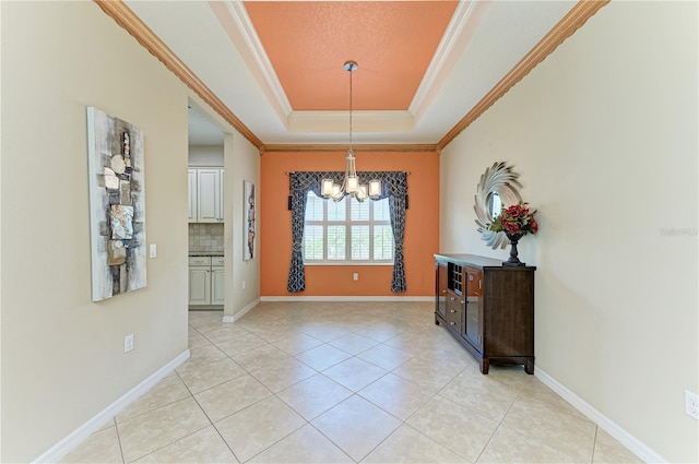 6516 Palm Leaf Ct, Sarasota, FL 34243 - dining room with a chandelier, a tray ceiling, light tile patterned floors, ornamental molding, and a textured ceiling