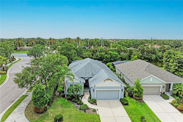 6516 Palm Leaf Ct, Sarasota, FL 34243 - view from above of property featuring a tree filled landscape