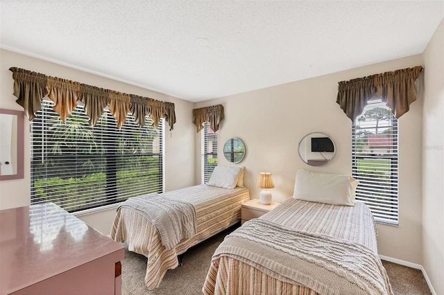 3617 Yellow Pine Ct Unit 144, Sarasota, FL 34238 - carpeted bedroom featuring baseboards