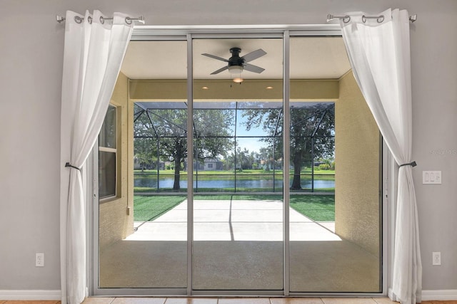 5005 Torrey Pines Run, Bradenton, FL 34211 - doorway featuring a water view and a ceiling fan