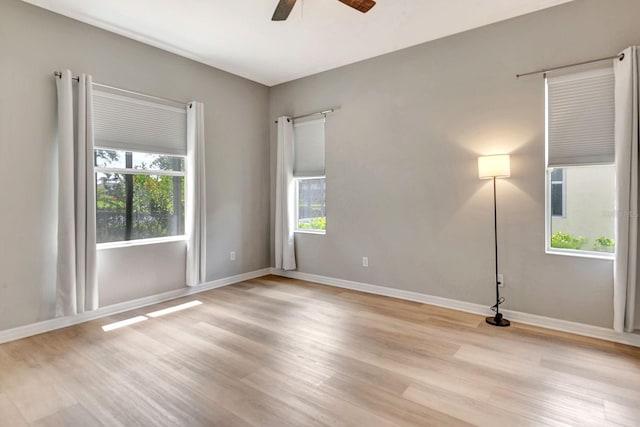 5005 Torrey Pines Run, Bradenton, FL 34211 - unfurnished room featuring healthy amount of natural light, a ceiling fan, and light wood finished floors