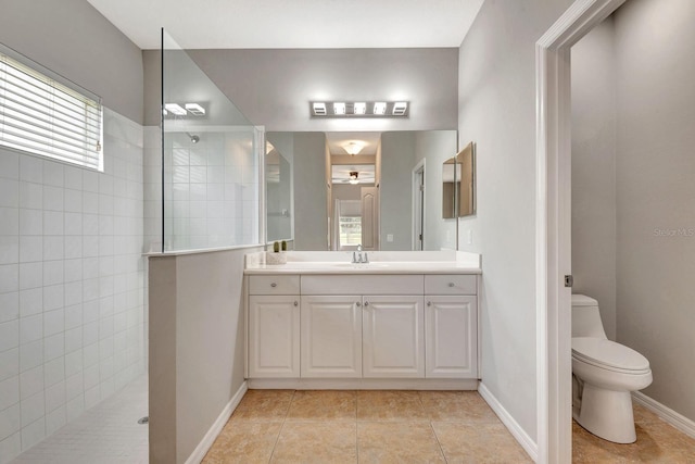 5005 Torrey Pines Run, Bradenton, FL 34211 - bathroom featuring walk in shower, vanity, tile patterned floors, and a ceiling fan