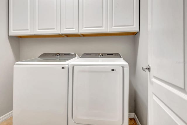 5005 Torrey Pines Run, Bradenton, FL 34211 - laundry room with independent washer and dryer and cabinet space